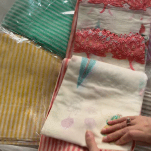 Sheer Pink Fabric with Intricate Flamingo and Floral Embroidery