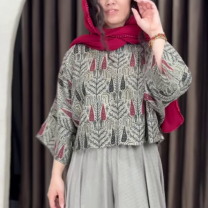 Women’s Red Printed Headscarf with Abstract Top & Gray Wide-Leg Pants – Boho Urban Doorway Portrait Ensemble