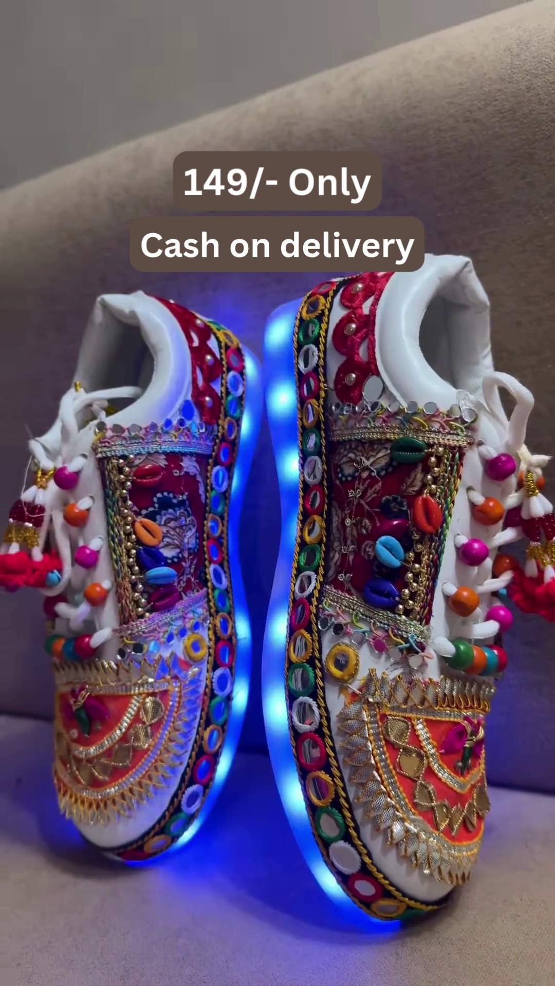 Unisex White Ethnic Mojari Footwear with Multicolor Bead Embroidery – Festive Pair with Red Light Showcase Styling - Image 6