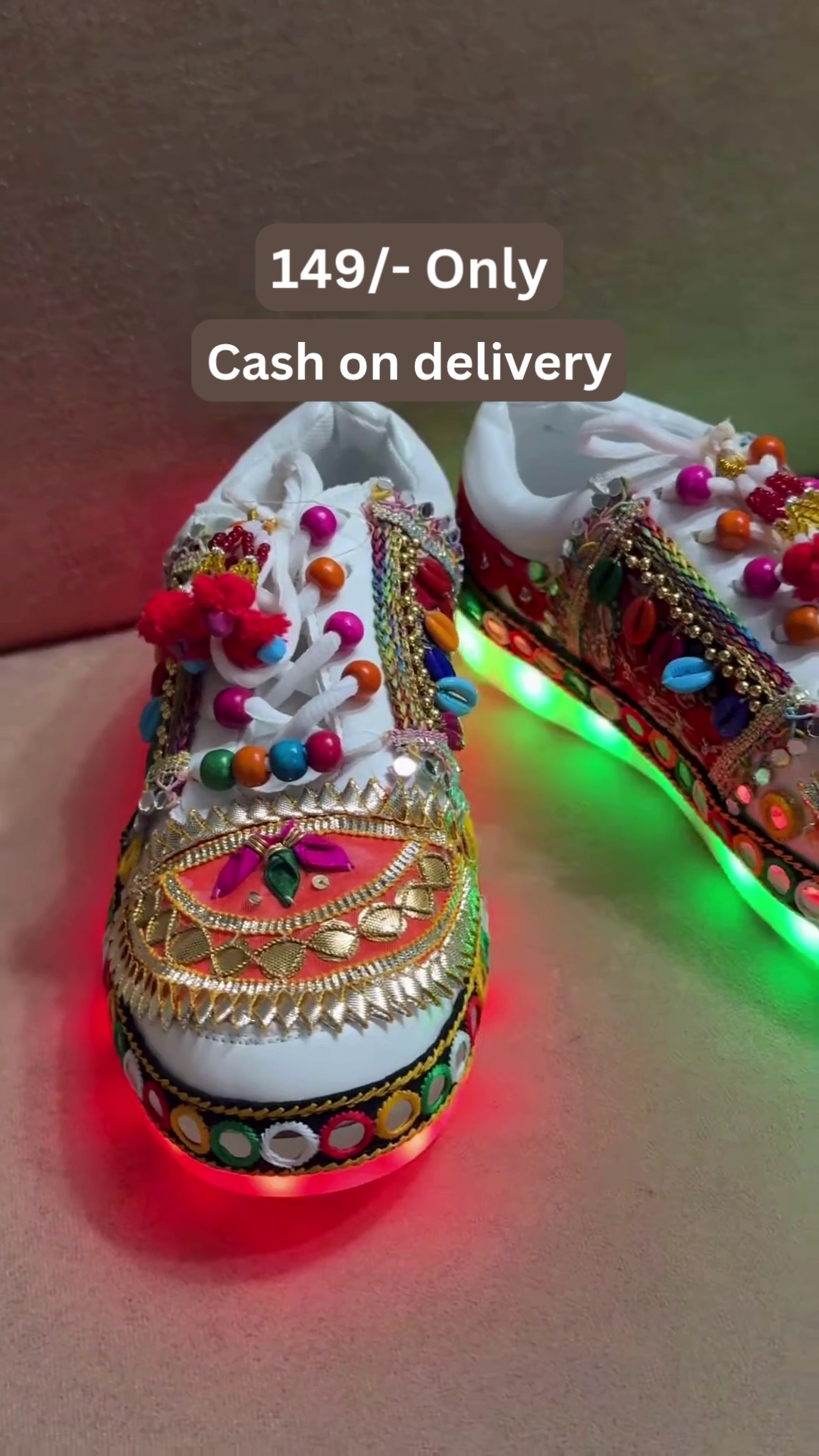 Unisex White Ethnic Mojari Footwear with Multicolor Bead Embroidery – Festive Pair with Red Light Showcase Styling - Image 5