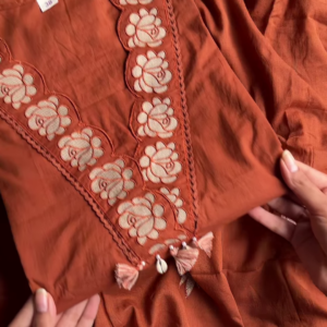 Women’s Reddish-Brown Ethnic Kurti with Floral Embroidery, Tassels & Shell Accents – Handcrafted Neckline Detailing for Festive Styling