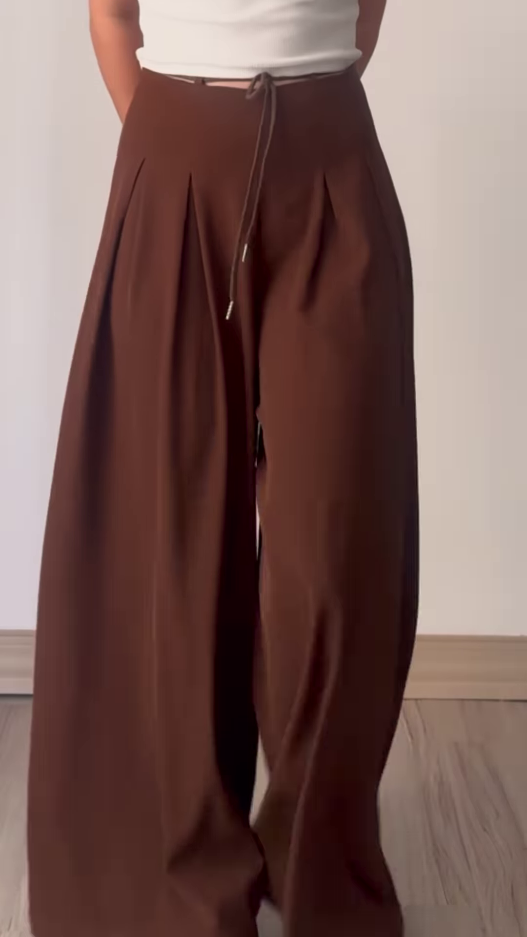 Women’s Beige Wide-Leg Pleated Pants with Drawstring Waist – Flowing Casualwear Styled with White Sneakers - Image 4