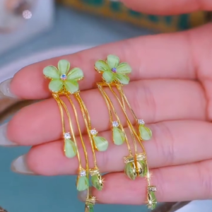 Whimsical Gold-Toned Flower Drop Earrings with Green Gemstone Accents and Delicate Chains