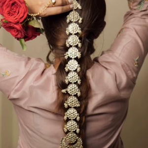 Elegant Bridal Hair Accessory (Matha Patti/Jhoomar) with Intricate Gold-Toned and Pearl Detailing
