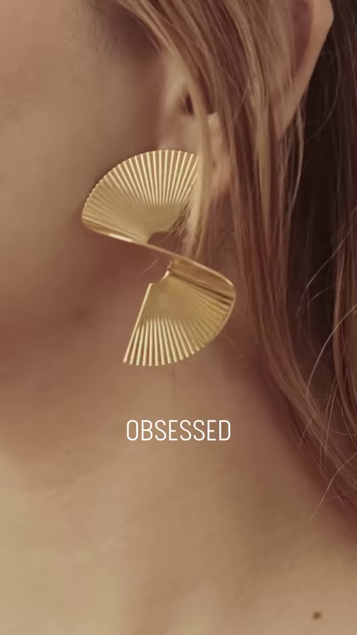 Close-Up of Stylish Gold-Toned Earrings: Teardrop, Stud, and Mesh Hoop - Image 5