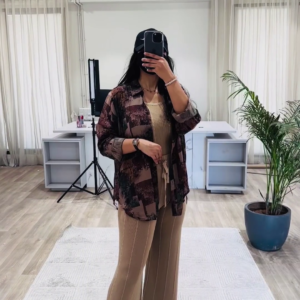 Bohemian Chic Outfit: Patterned Overshirt, Knit Top, and Wide-Leg Pants