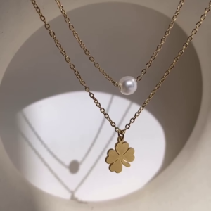 Delicate Layered Gold-Toned Necklace with Four-Leaf Clover and Pearl Pendants