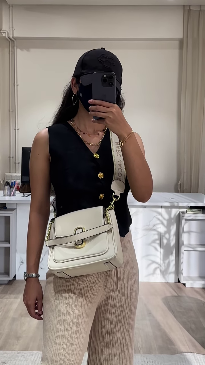 Chic Sleeveless Knit Top with Button Front and Wide-Leg Knit Pants Outfit - Image 3