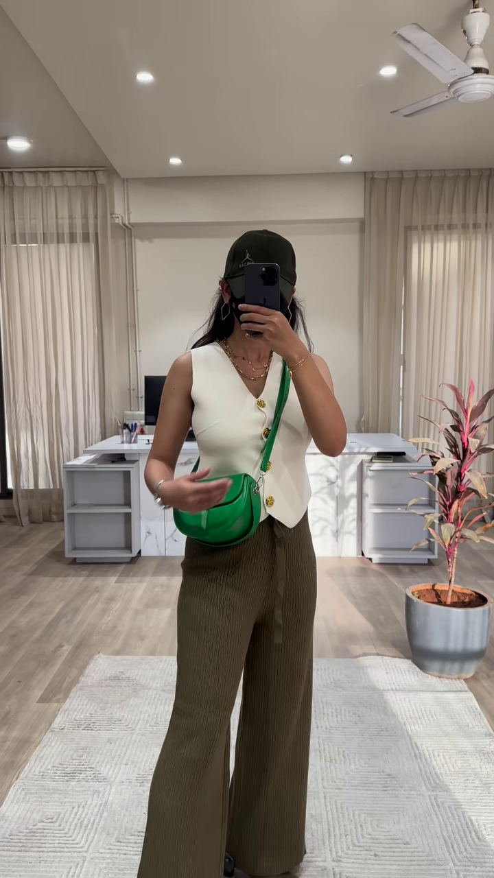 Chic Sleeveless Knit Top with Button Front and Wide-Leg Knit Pants Outfit - Image 4