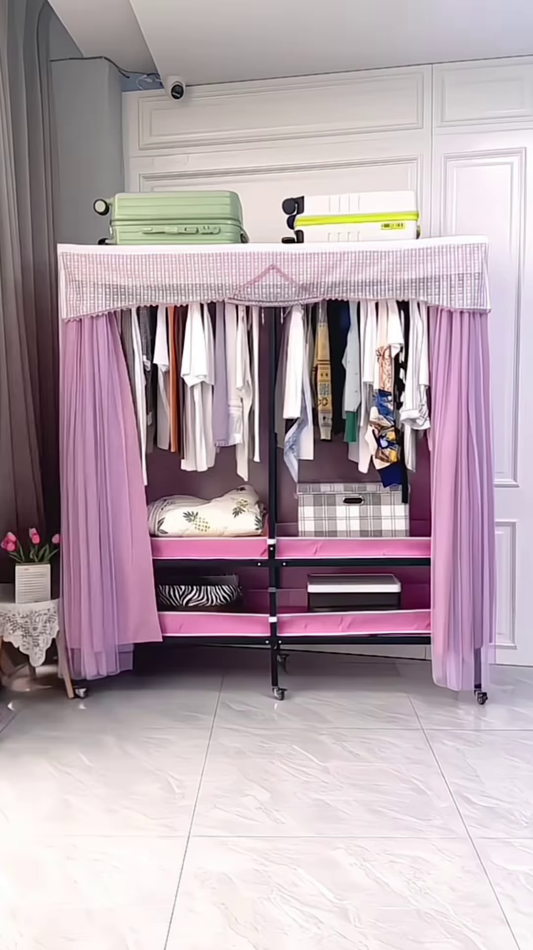 "Portable Fabric Wardrobe Organizer - Lightweight Rolling Clothes Storage with Lavender Curtains"