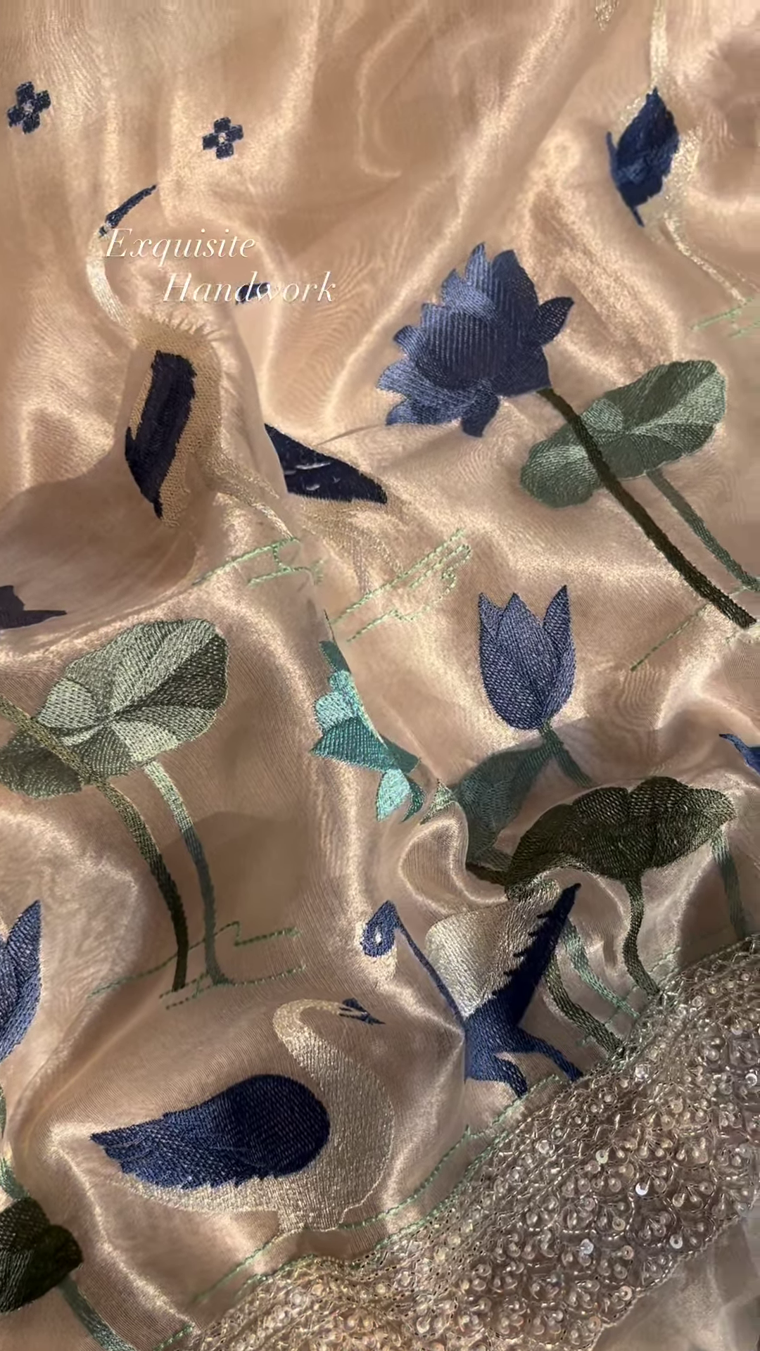 Close-Up of Exquisite Silk Fabric with Hand-Embroidered Lotus and Swan Motifs - Image 3